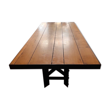 Oak table with Eiffel beam legs.
