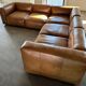 Modular corner sofa + pouf/ottoman in cognac Buffalo leather