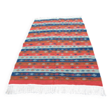 Authentic handmade Tunisian Berber kilim rug in orange wool.