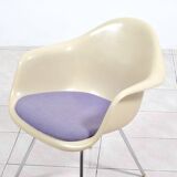 4 Eames DAX fiberglass lounge chairs with purple upholstery by Herman Mille