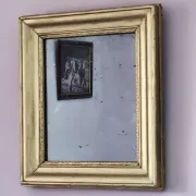 Small Art Deco mirror with a gilded wooden frame.