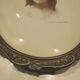 Old wall frame in carved wood and gilded stucco, oval