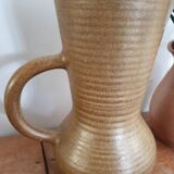 High pitcher in sandstone