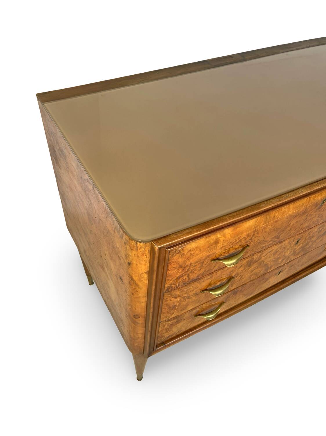 Veneered burl walnut chest of drawers with light warm brown glass top