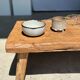 Coffee table in blond teak quadripod
