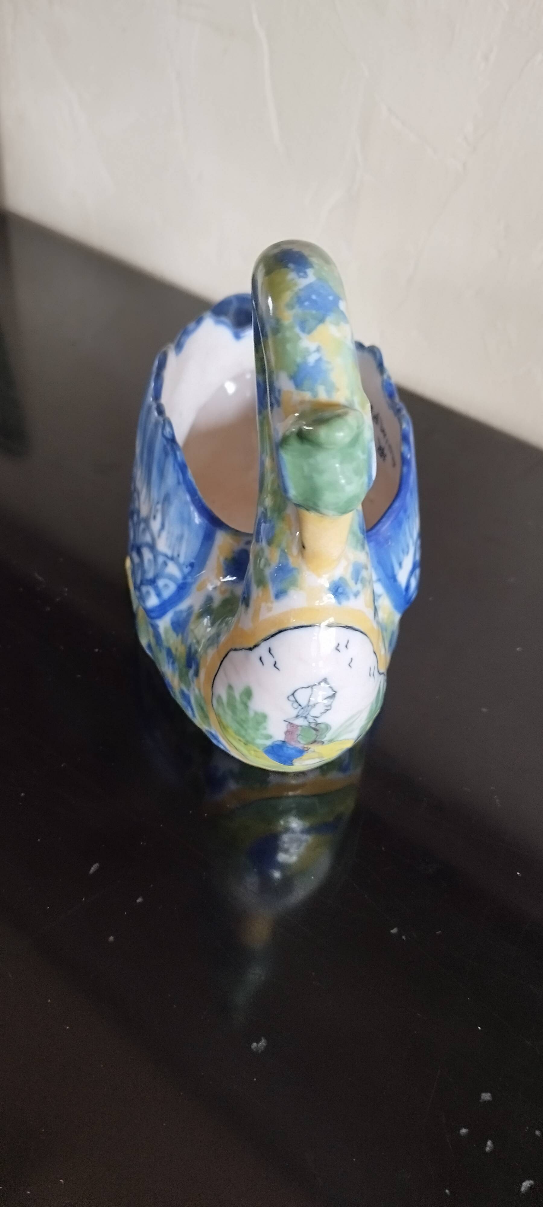 Ashtray or small planter in the shape of a swan made of Quimper earthenware.