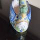 Ashtray or small planter in the shape of a swan made of Quimper earthenware.