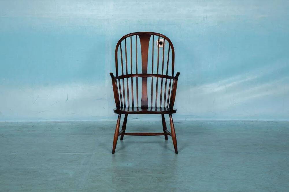 Ercol model 472 fireplace chair from the 1960s in beech.