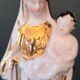 Virgin and Child + small vase. Gilded with fine gold