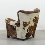 Fauteuil art déco en peau de vache