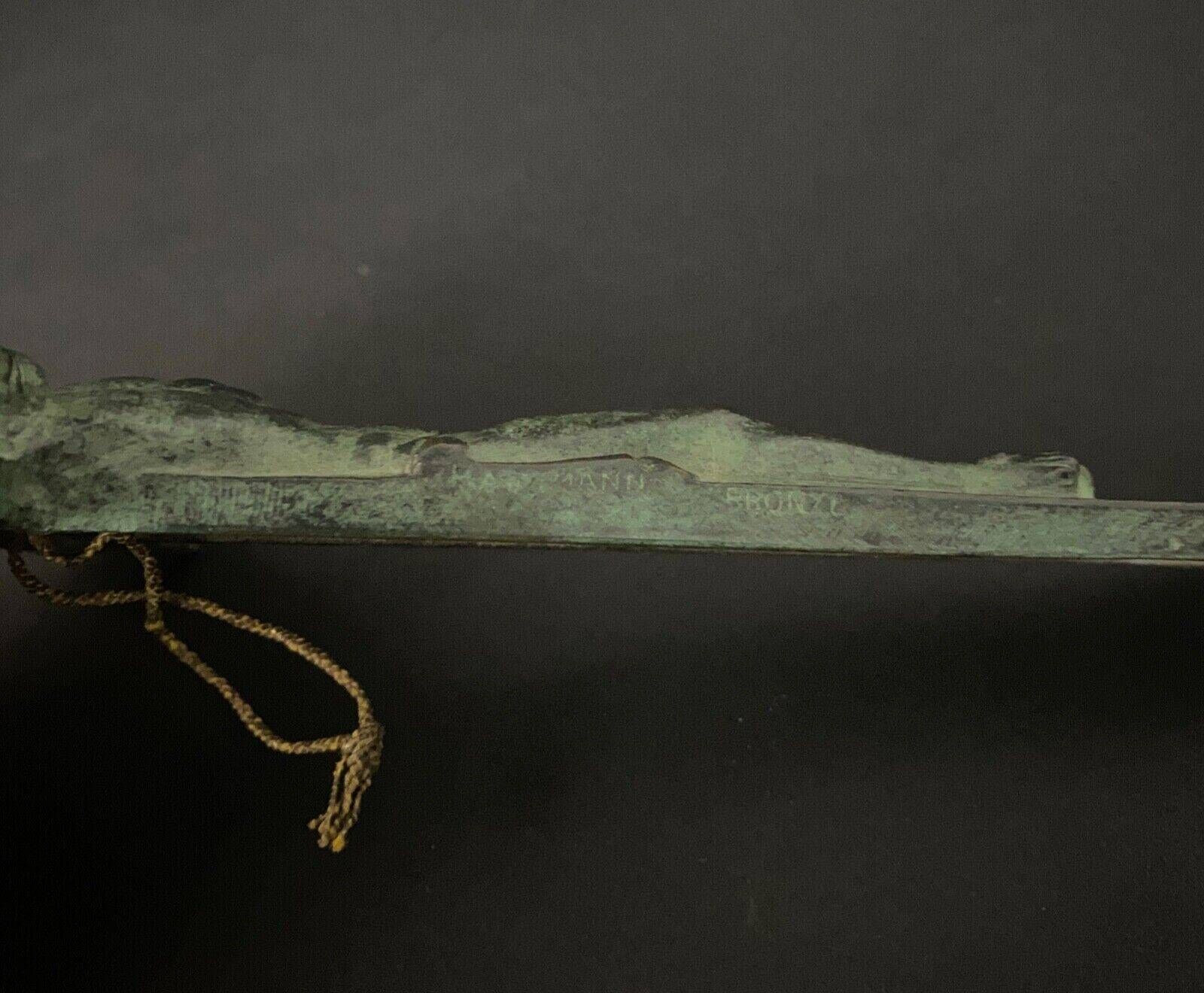 20th century bronze crucifix with green patina in the style of the Haute Epoque
