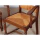 Pair of oak straw-seated armchairs from the 1950s.