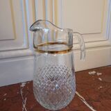 carafe en verre et bord doré
