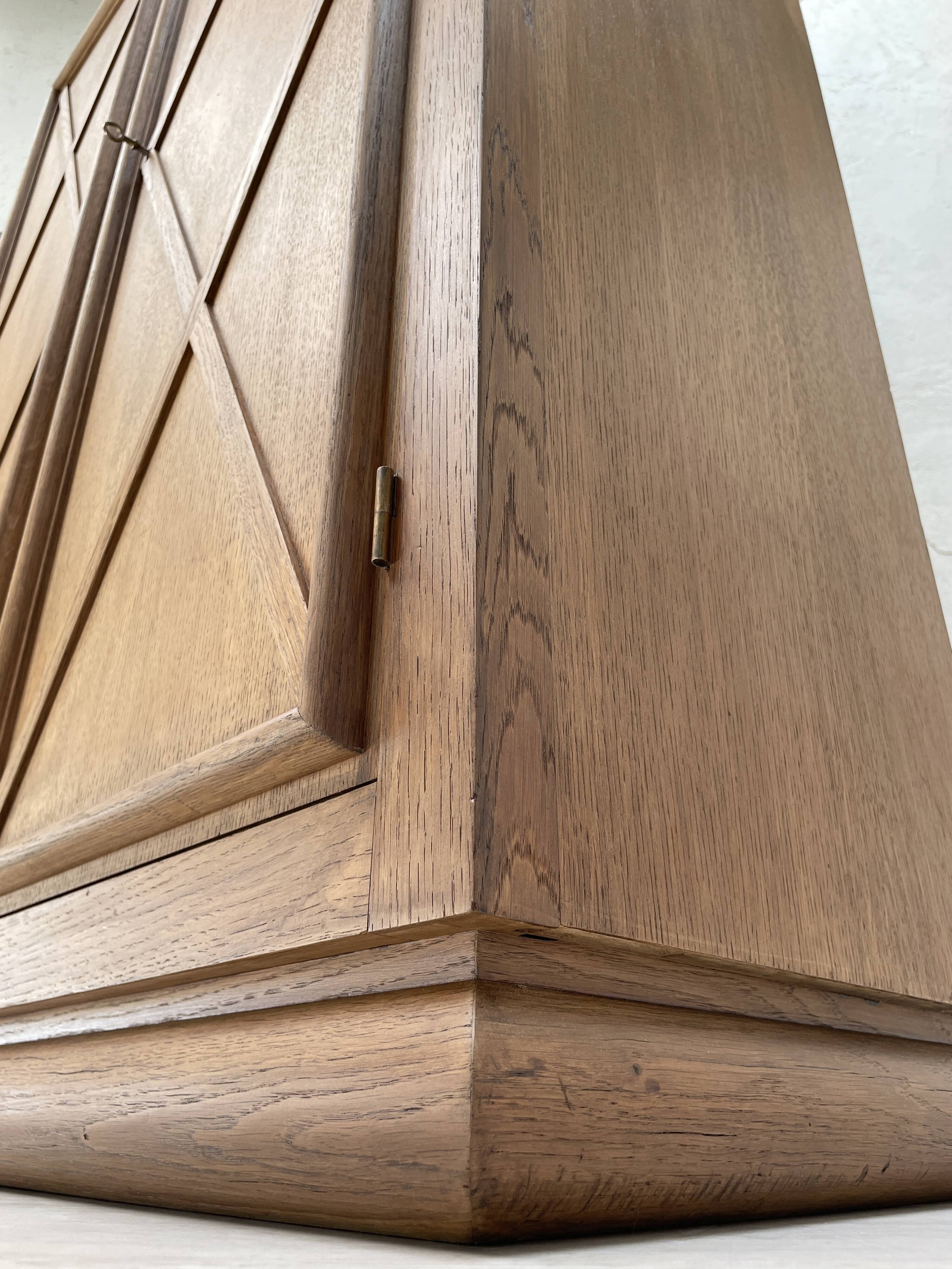 Storage unit in solid oak and veneer, circa 1960.