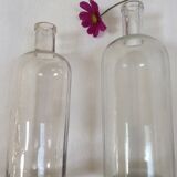 Pair of former pharmaceutical glass bottles