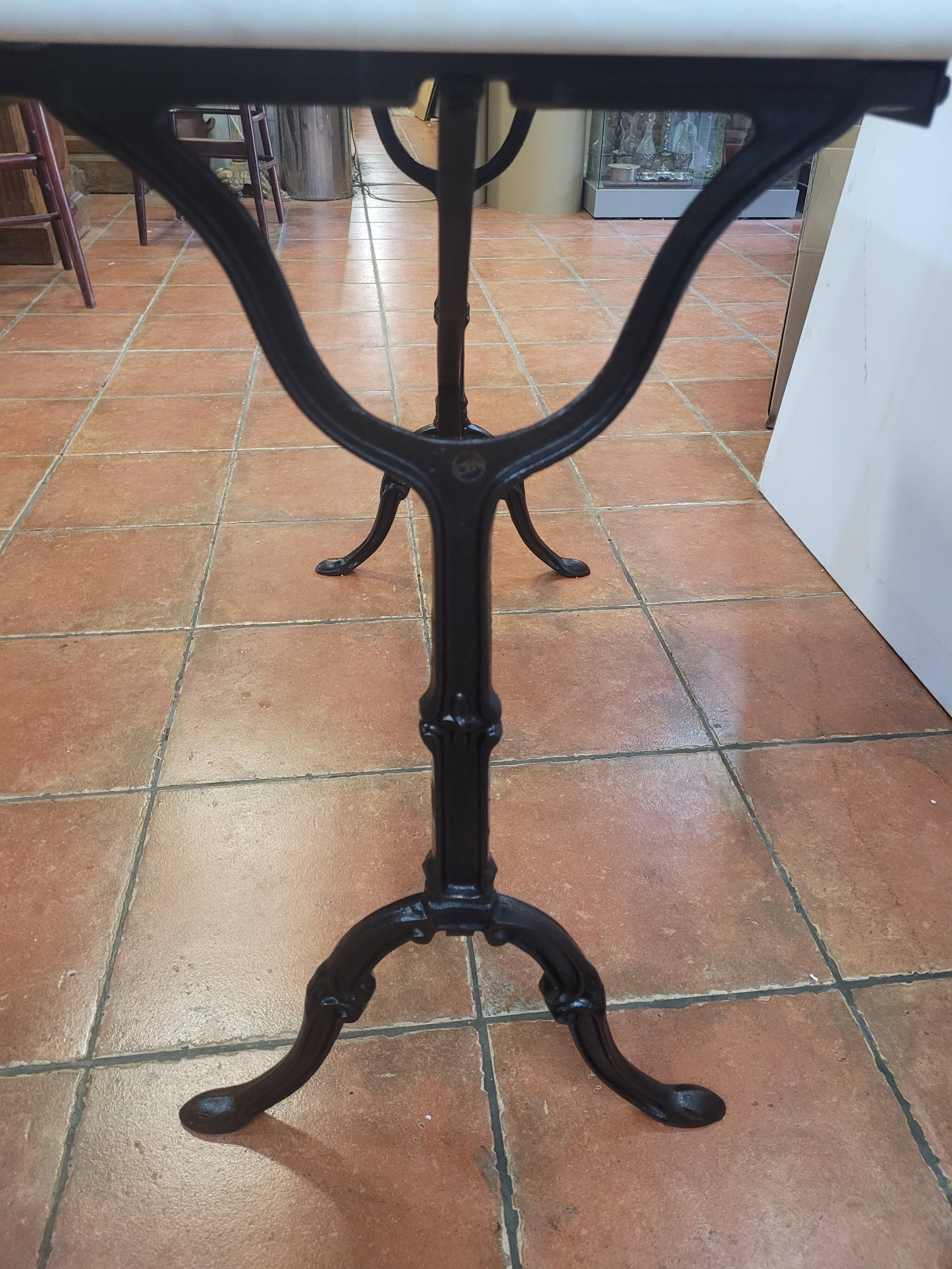 Bistro table base cast iron over marble