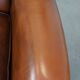 Brown leather wingback Chesterfield armchair