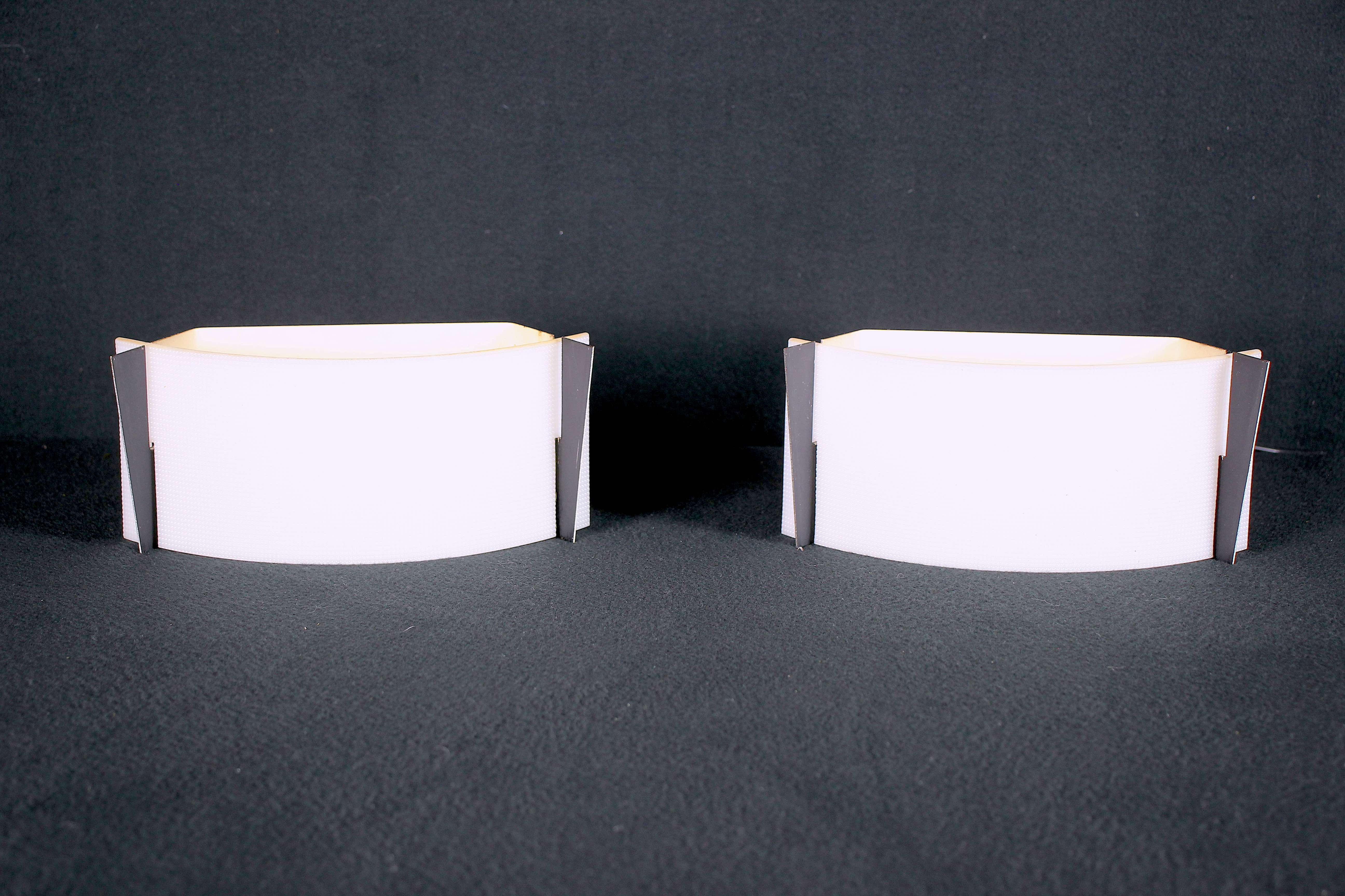 Pair of mid-century wall lamps in black metal and perspex, france