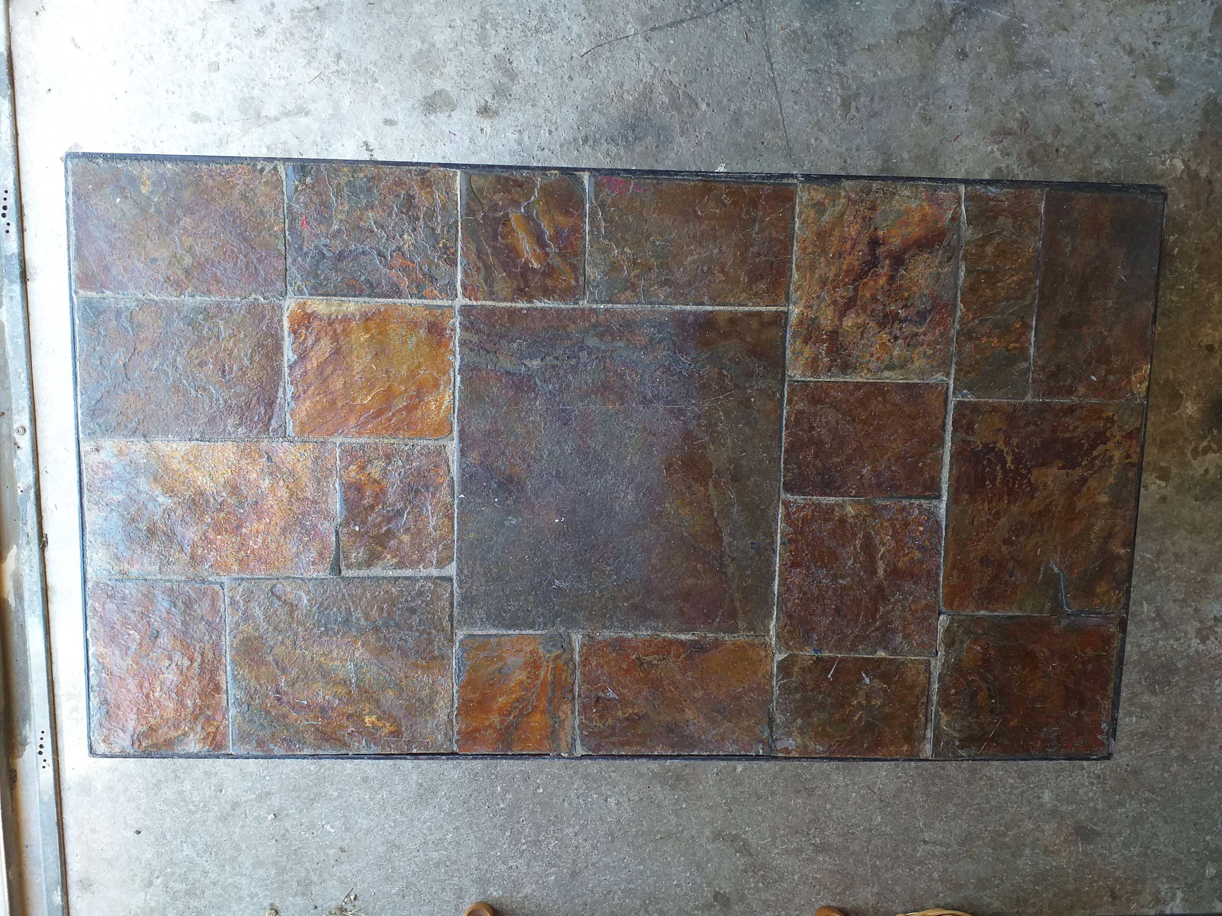 Slate and wrought iron coffee table