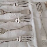 Lot de 7 fourchettes de table en argent massif
