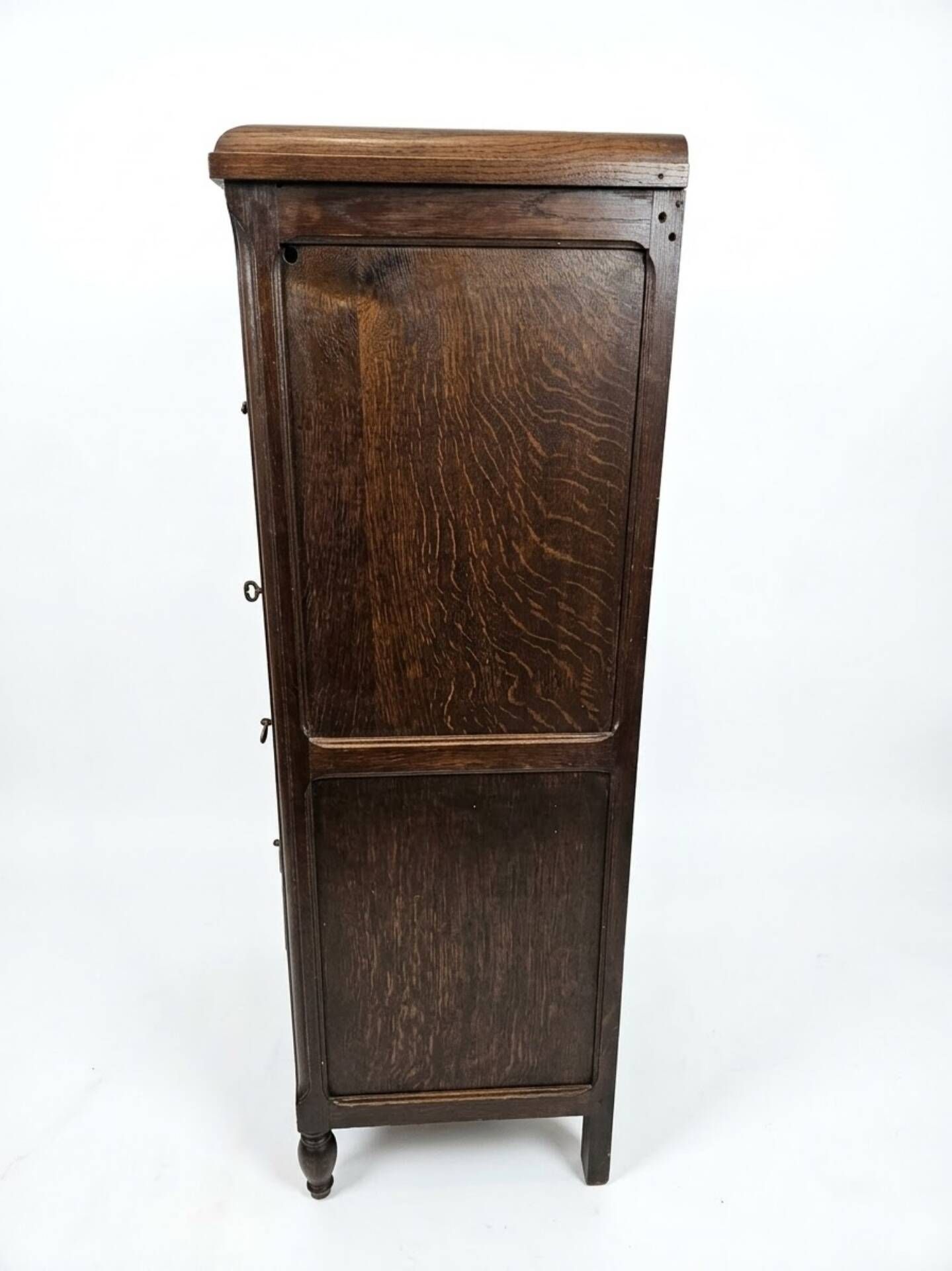 Vintage oak furniture with mesh doors.