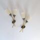 Mid-century pair of wall lamps in brass and opaline attributed to Asea Sweden, 1950s.