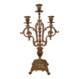 Bronze candlestick with lion head decoration