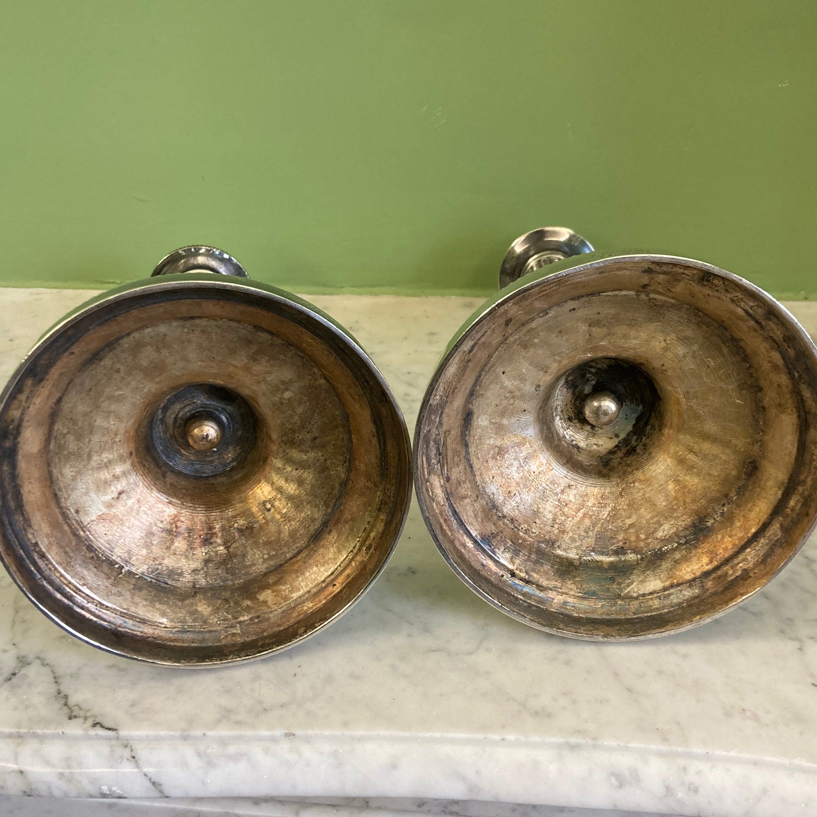 Pair of silvered bronze candlesticks from the 19th century in Louis XVI style signed Voisenet.