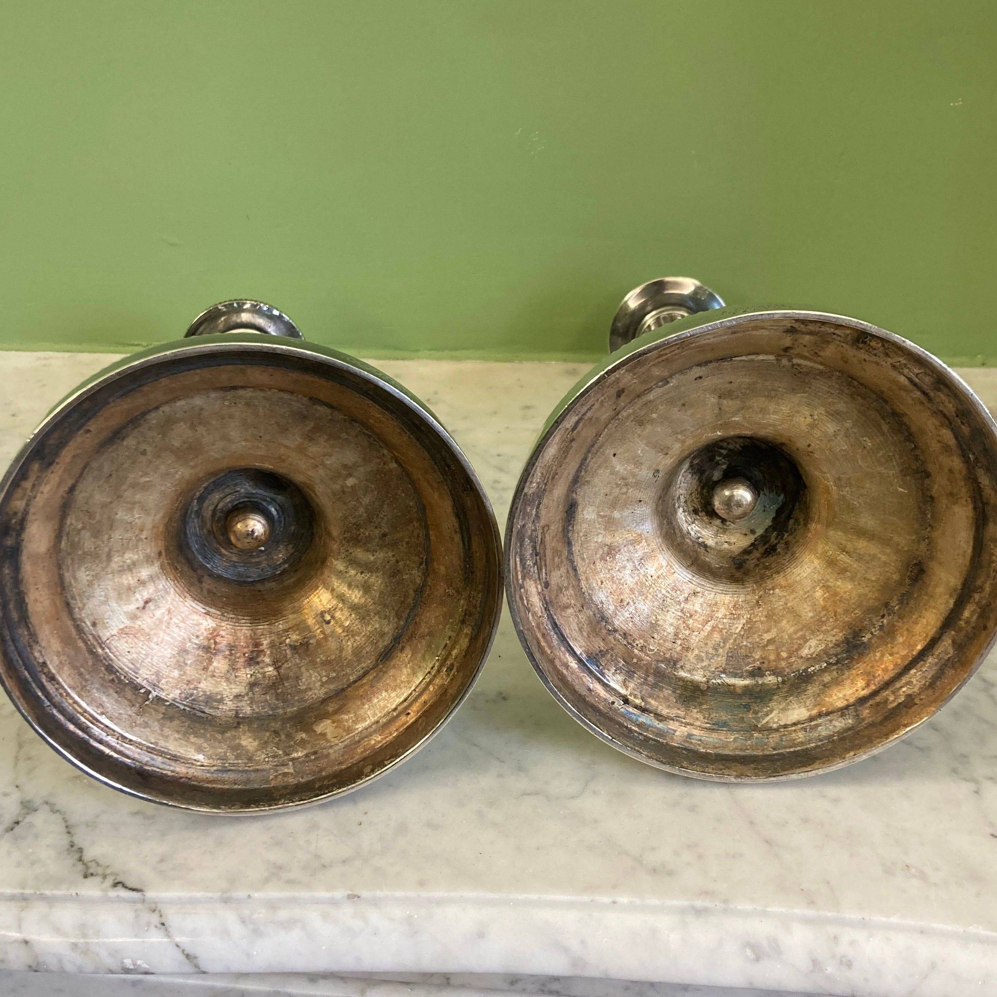 Pair of silvered bronze candlesticks in the Louis XVI style signed Voisenet, 19th century.