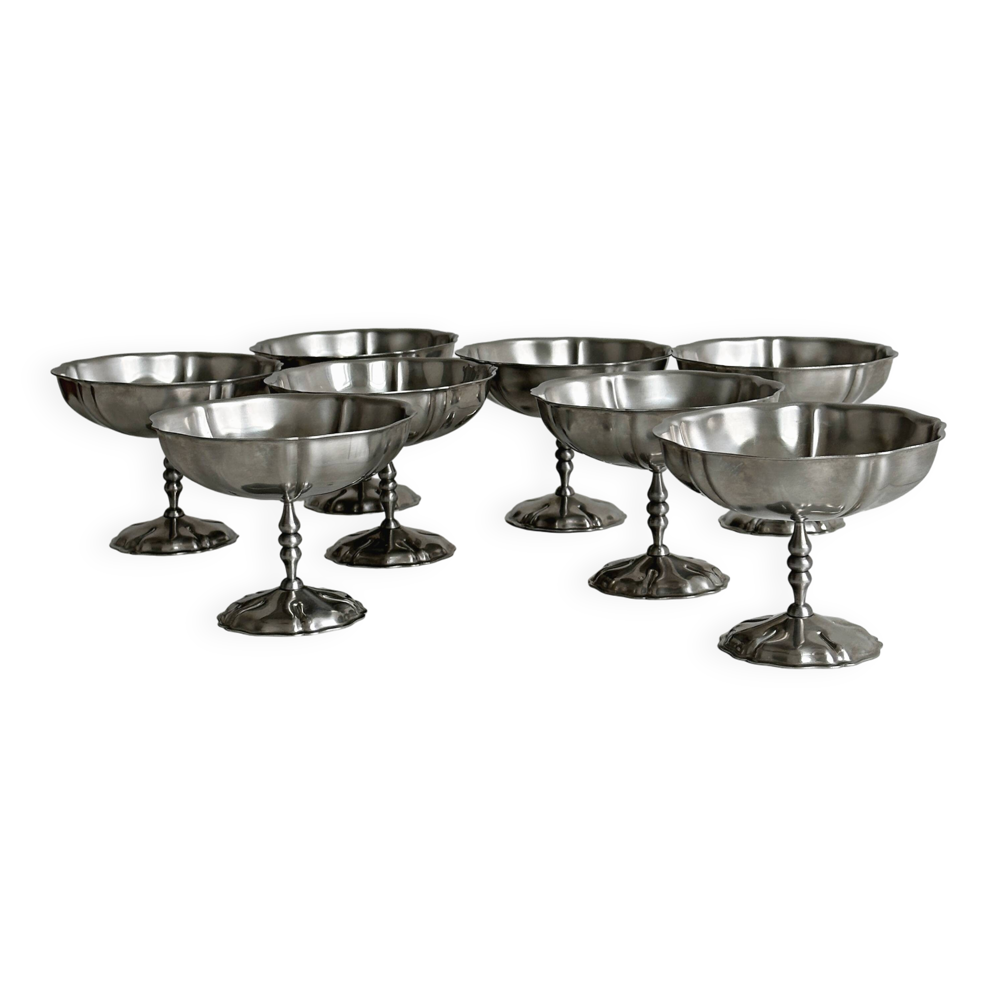 8 very large stainless steel footed bowls