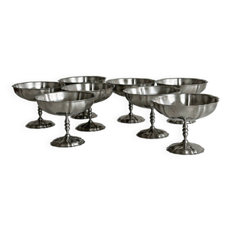 8 very large stainless steel footed bowls