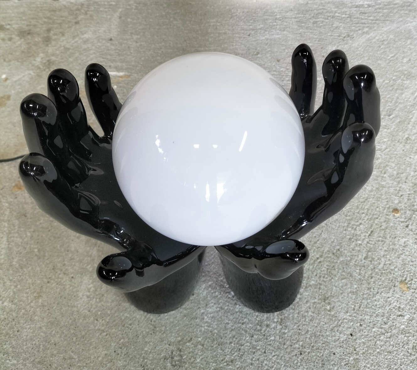 Black and white opaline hand lamp.