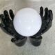 Black and white opaline hand lamp.