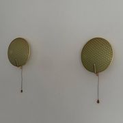 Pair of green plexiglass and gold metal wall lights by Erco, 1950s, Germany.