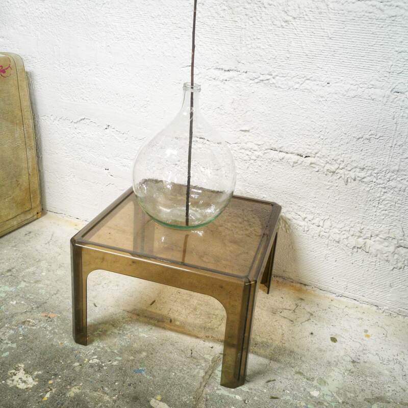 Smoked plexiglas coffee table