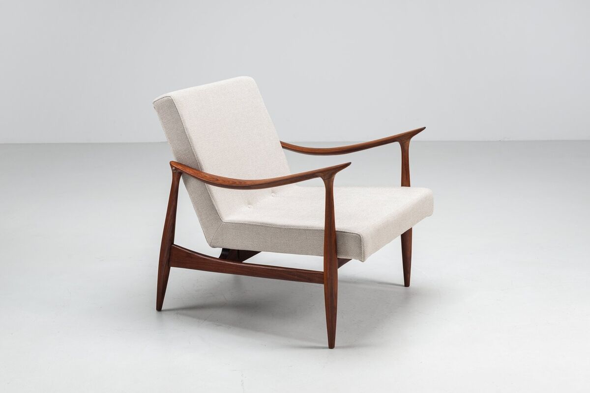 Sculptural Danish lounge chair in teak and fabric Denmark 1960