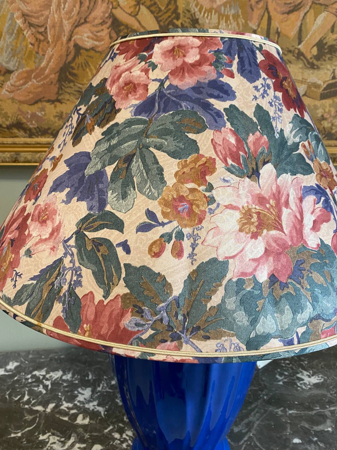 Large blue ceramic lamp with floral shade