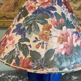 Large blue ceramic lamp with floral shade
