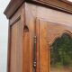 Walnut glazed bookcase with nineteenth century rose window