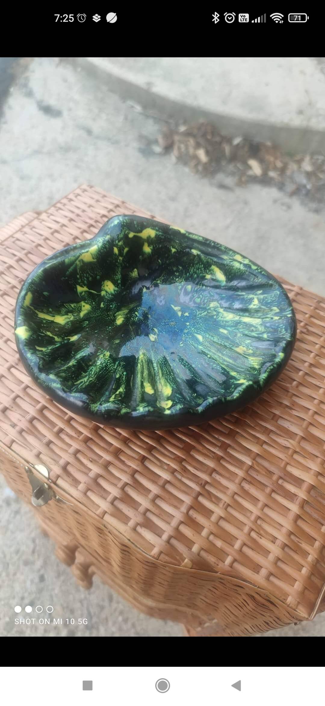 Ceramic ashtray or trinket dish in the shape of a seashell