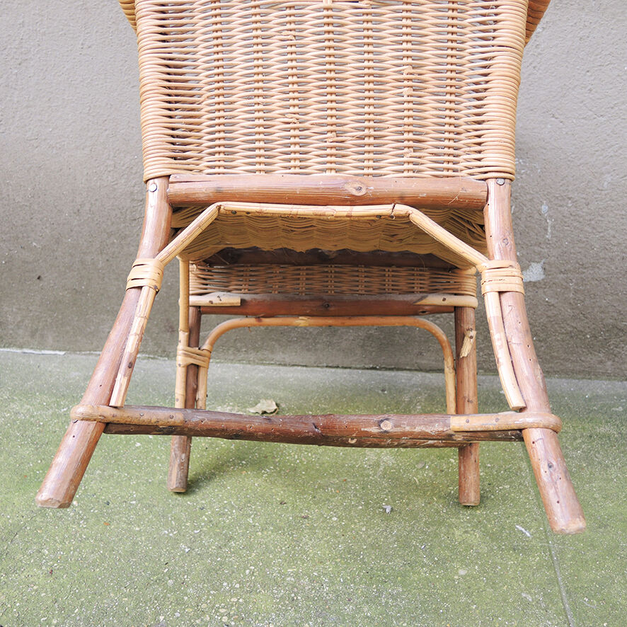 Old wicker chair for children