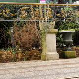 Glass mirror with a decoration engraved with golden foliage 1960