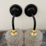 Set of two chiseled glass sconces