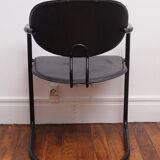 Fauteuil noir pieds en arc