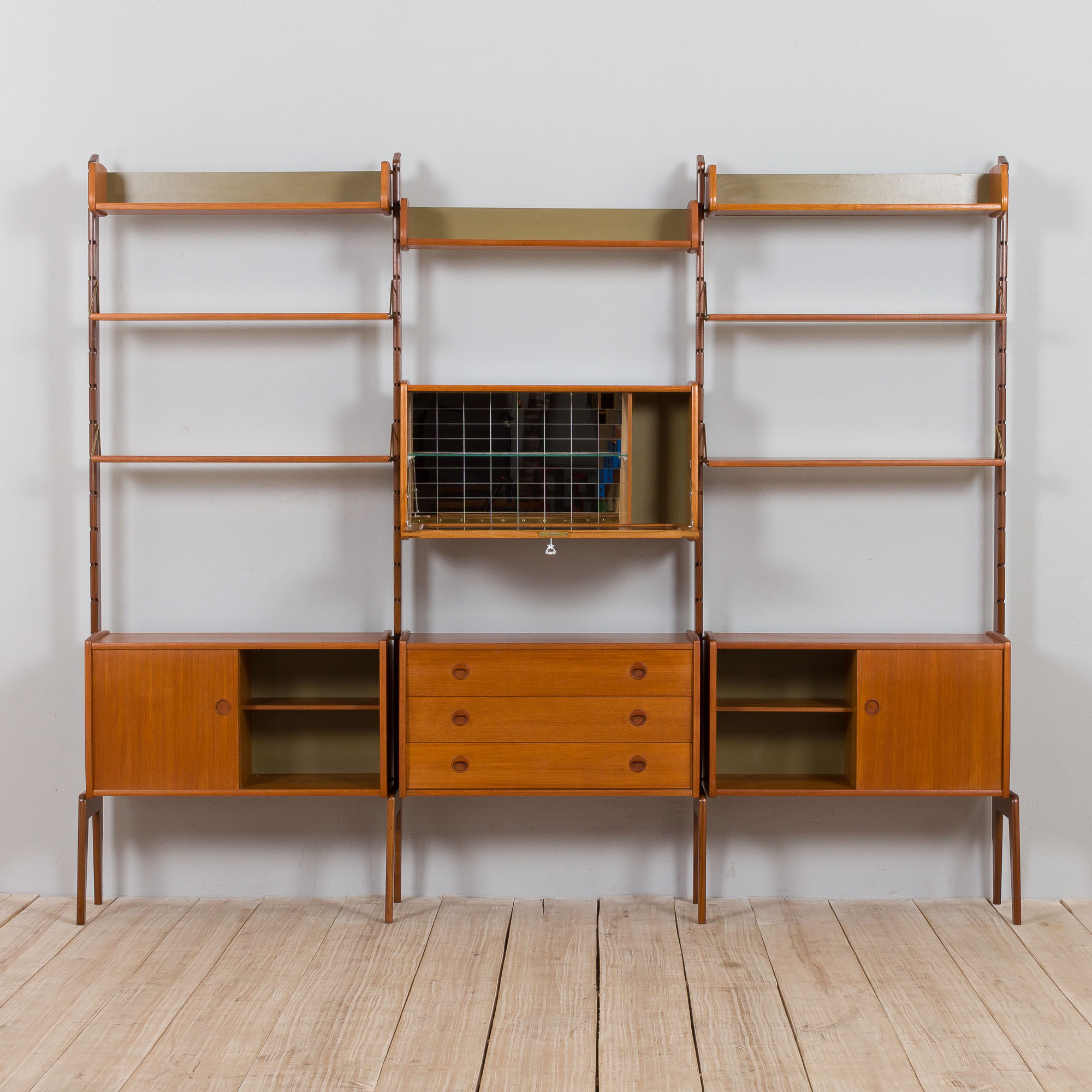 Scandinavian  free standing  Ergo wall unit bar cabinet and 3 cabinets and with 7 shelves,  by John