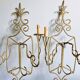 Gold wrought iron wall lights