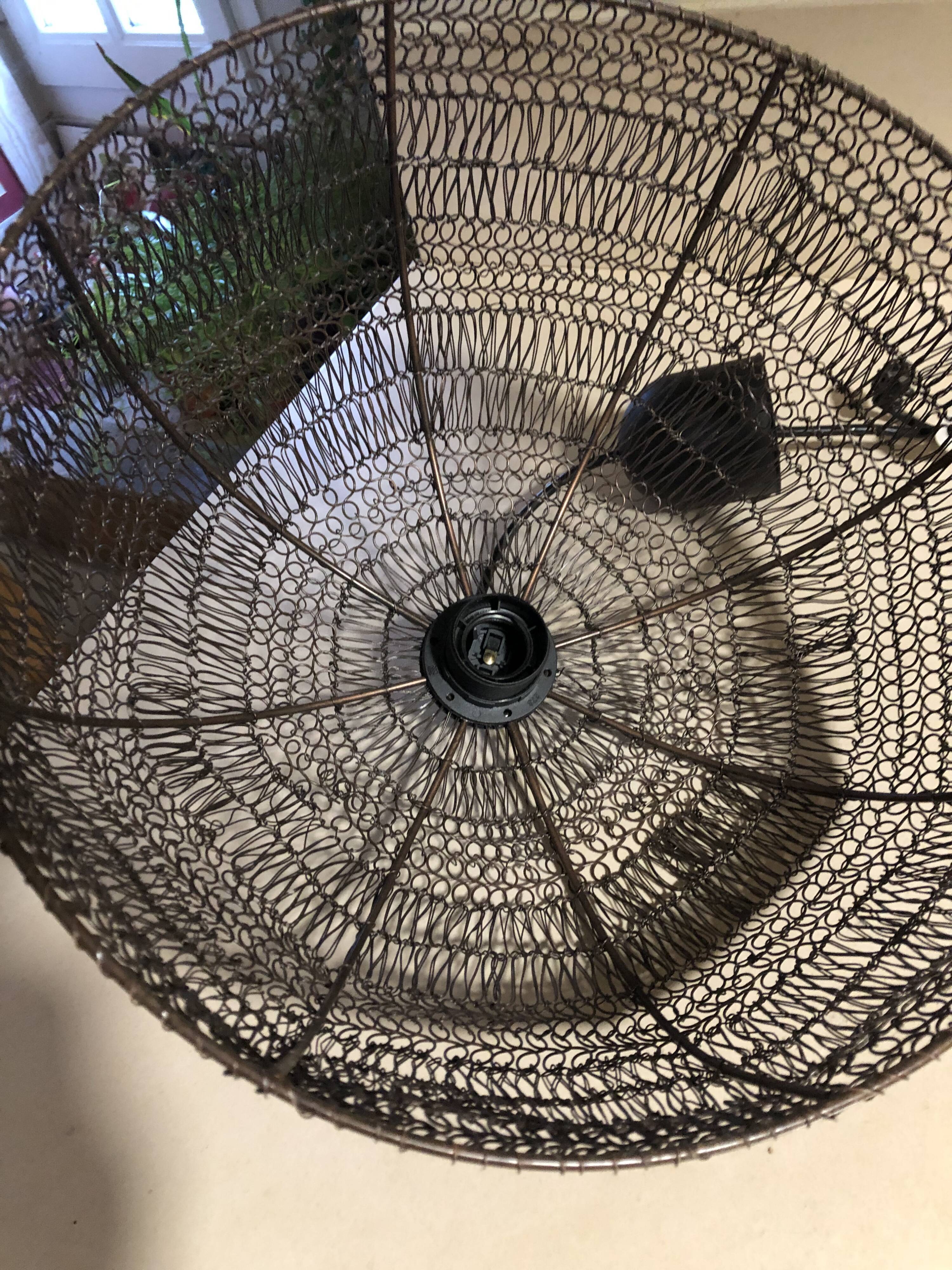 Woven metal suspension