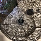Woven metal suspension