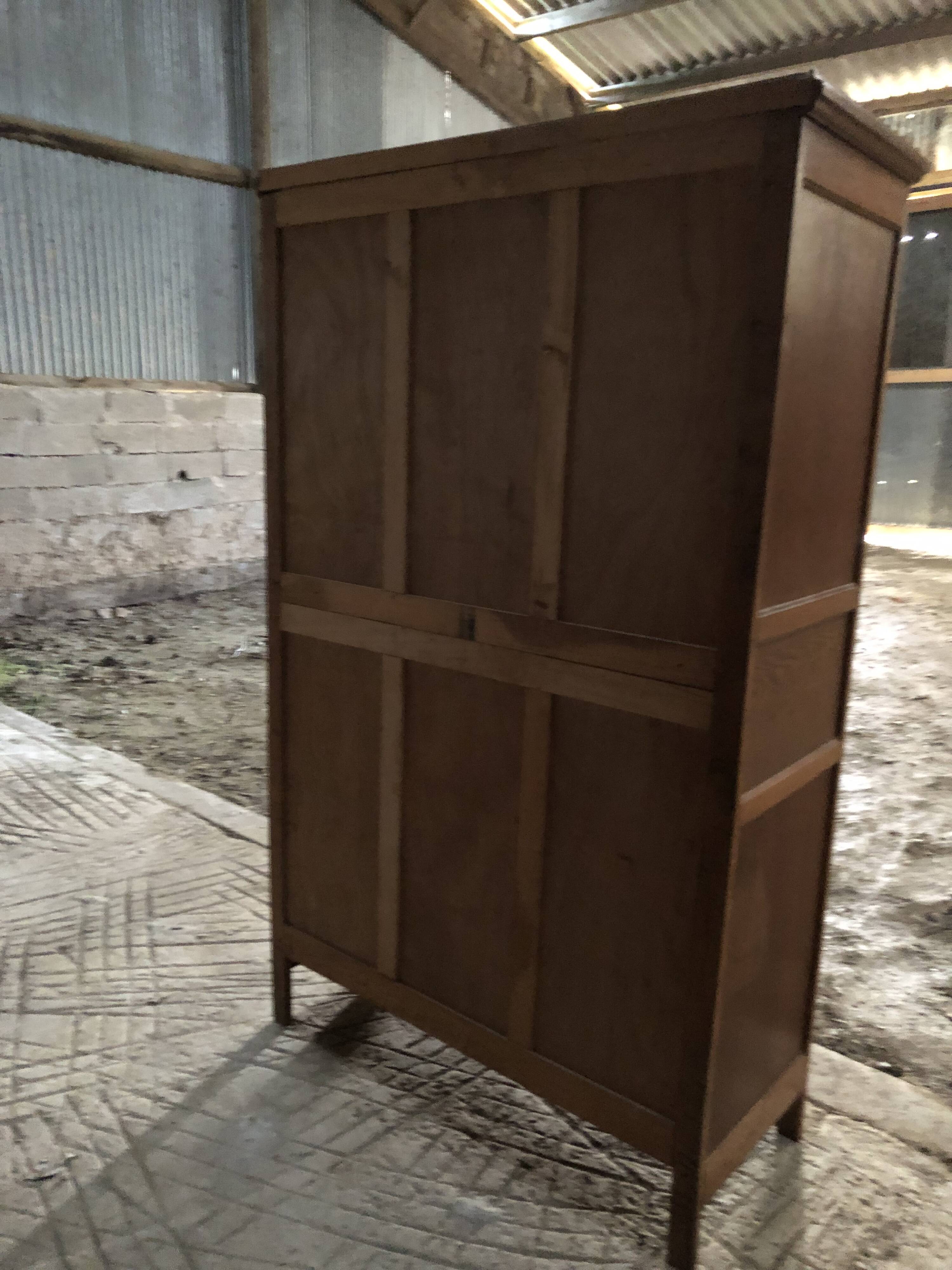 Vintage rococo oak bookcase with 2 glass doors.
