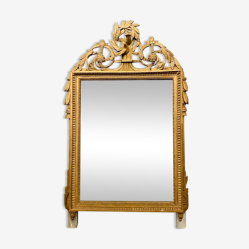 Louis XVI style mirror in wood and gilded stucco XIX century,, 122x72 cm